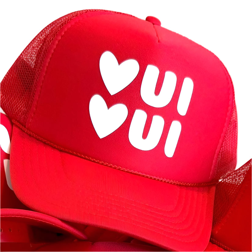 Retro-inspired “Oui Oui” foam trucker hat with playful French phrase, mesh back, and adjustable snapback—perfect for travel, fashion lovers, and Paris-themed gifts.