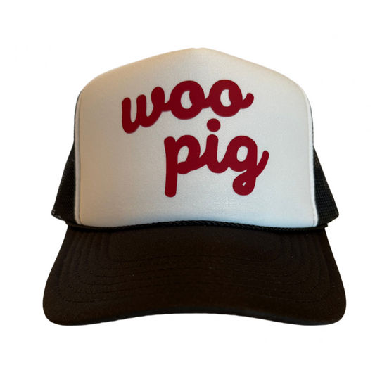 Trucker hat with woo pig in script. Black and white with red ink.