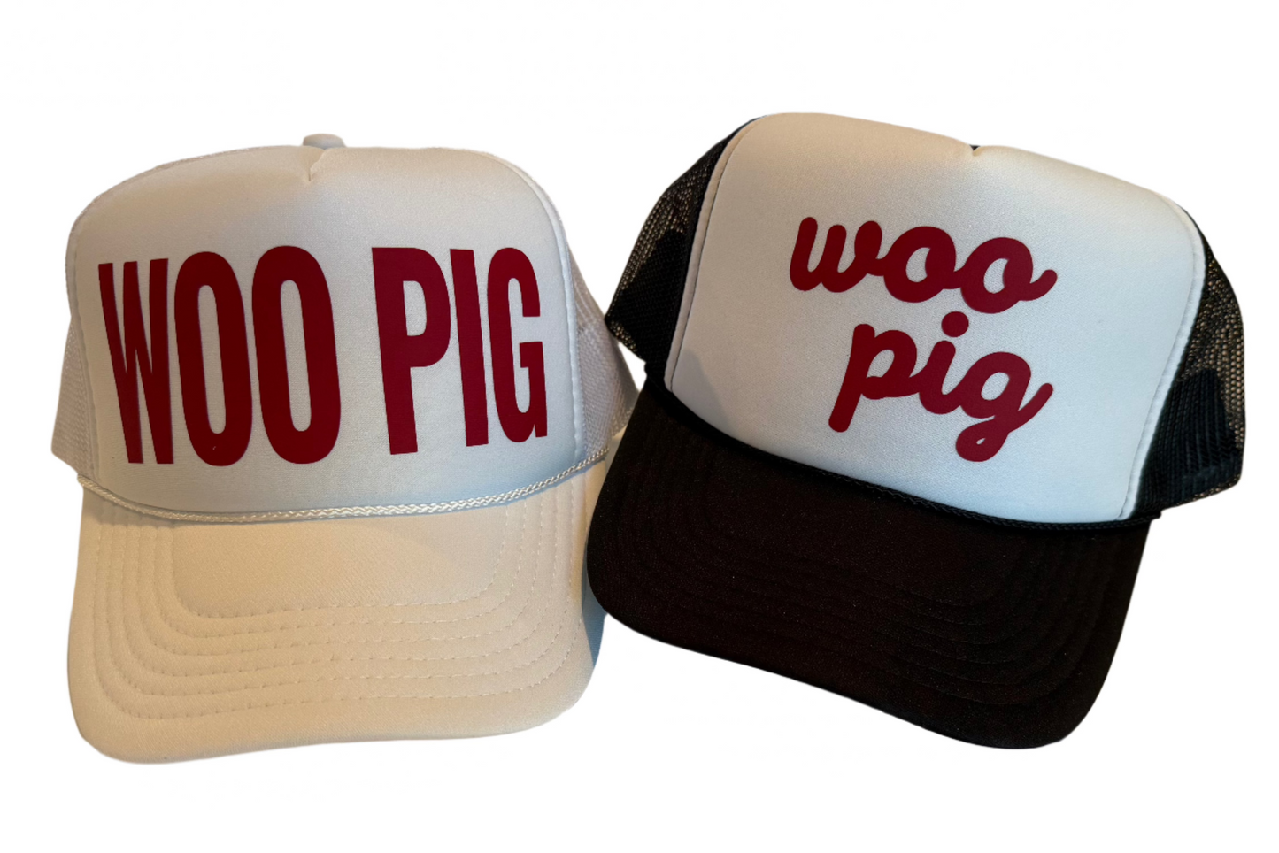 Woo pig trucker hats in script and block font on white and black and white hat